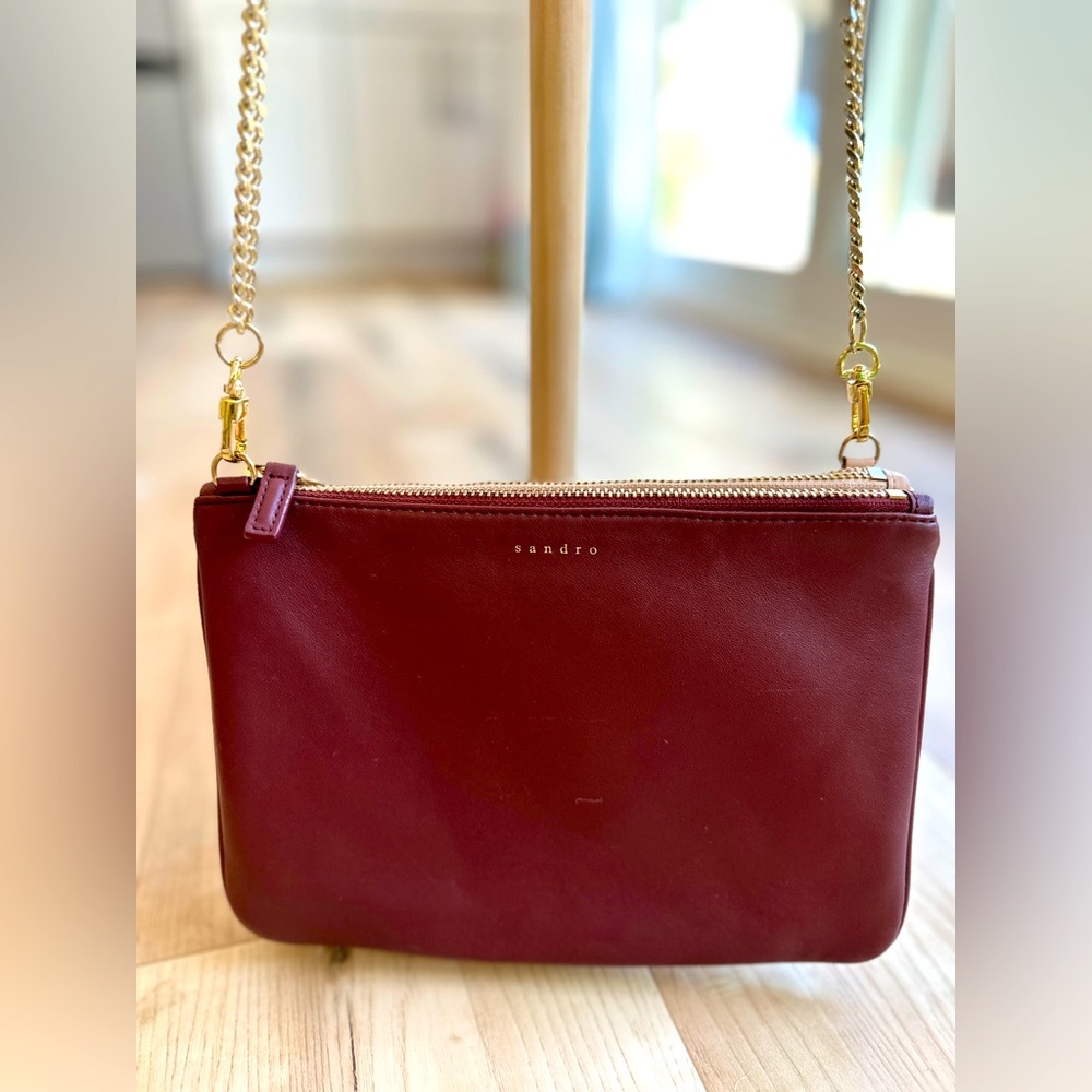 Sandro addict cross body bad burgundy and light pink.